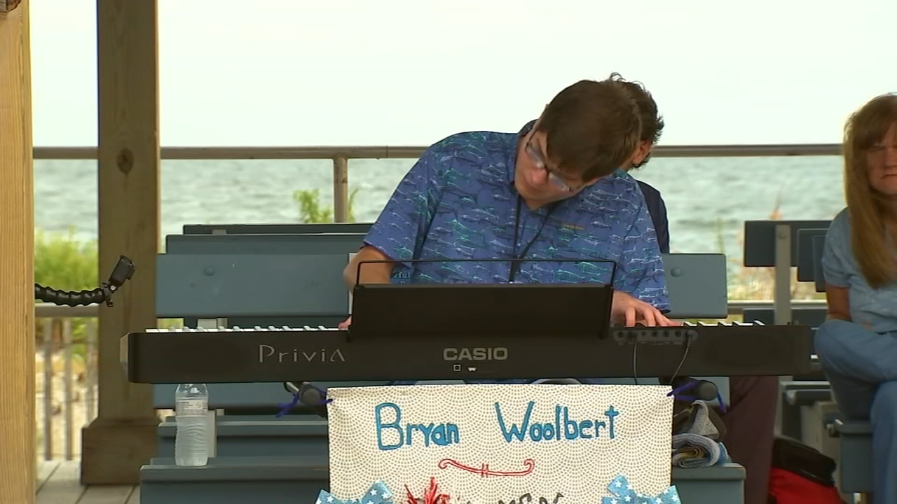 Image of Bryan Woolbert performing on the Ocean City NJ Boardwalk, 6ABC Action News, Link Graphic